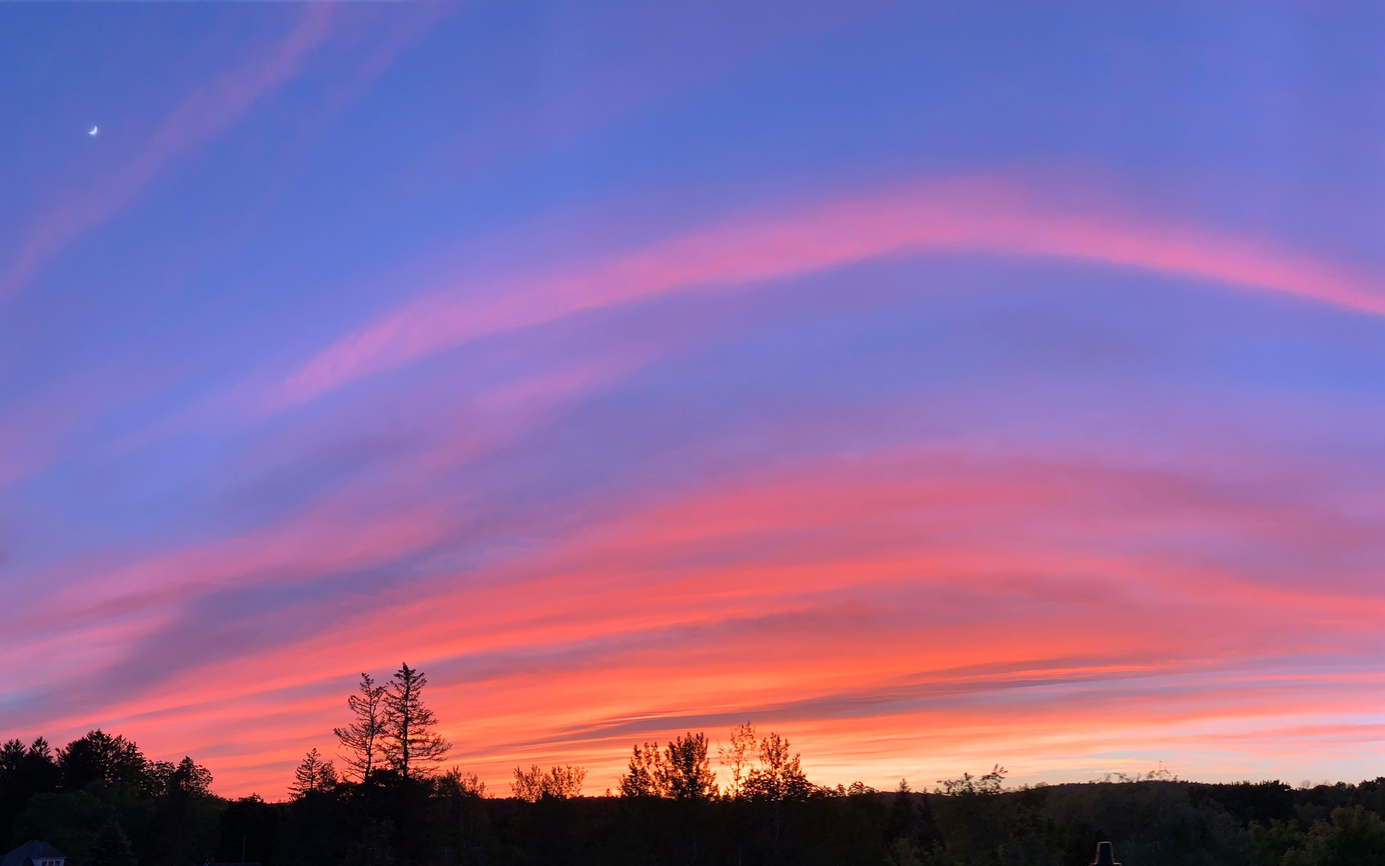 Sunset with pink clouds and a blue sky. Opal Theory Polish Drenched Skies inspiration.